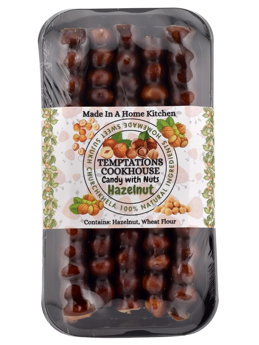 Hazelnut – Nut Lover’s Sweet Sujukh Dream
Hazelnut fans, rejoice! Our Hazelnut Sweet Sujukh skips the walnuts and leans all-in on buttery, rich hazelnuts, hand-threaded and coated in luscious grape molasses. It’s simple. It’s bold. And it’s a little hard to find anywhere else.
💬 Like Nutella’s cool, grown-up cousin who doesn’t need the sugar rush.
With no additives, no preservatives, and no gimmicks — this is a nut-packed Churchkhela for people who crave authenticity with a nutty kick.
✔ Unique & H